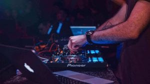 dj-operating-a-disc-mixer